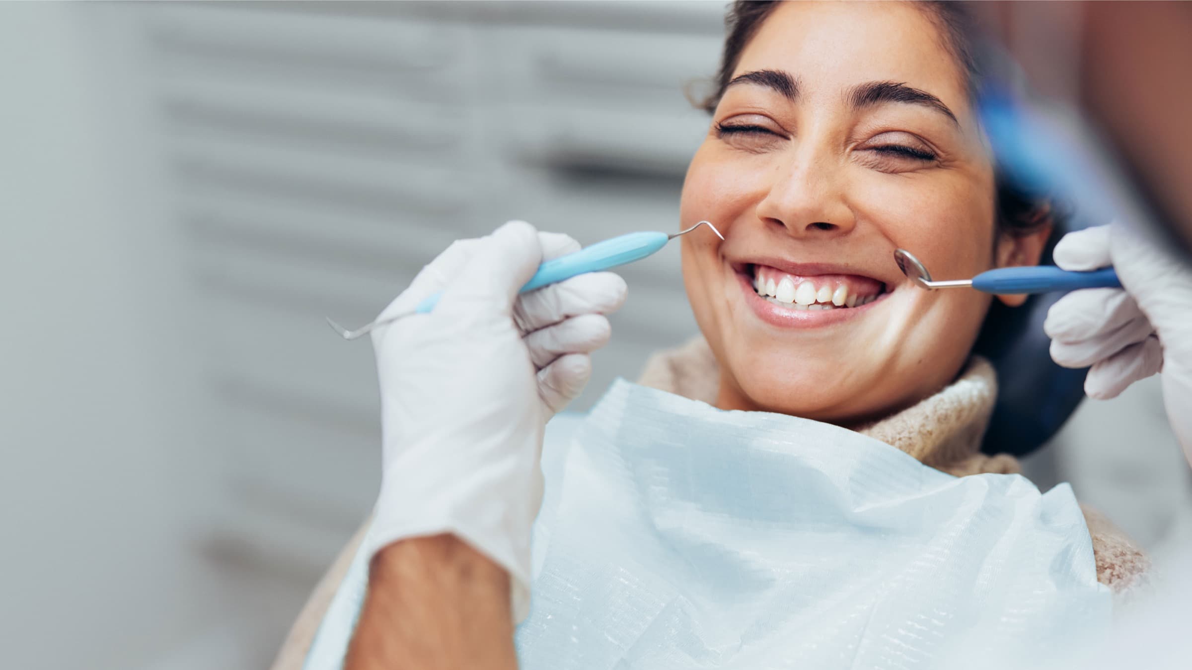 woman happy to be at the dentist